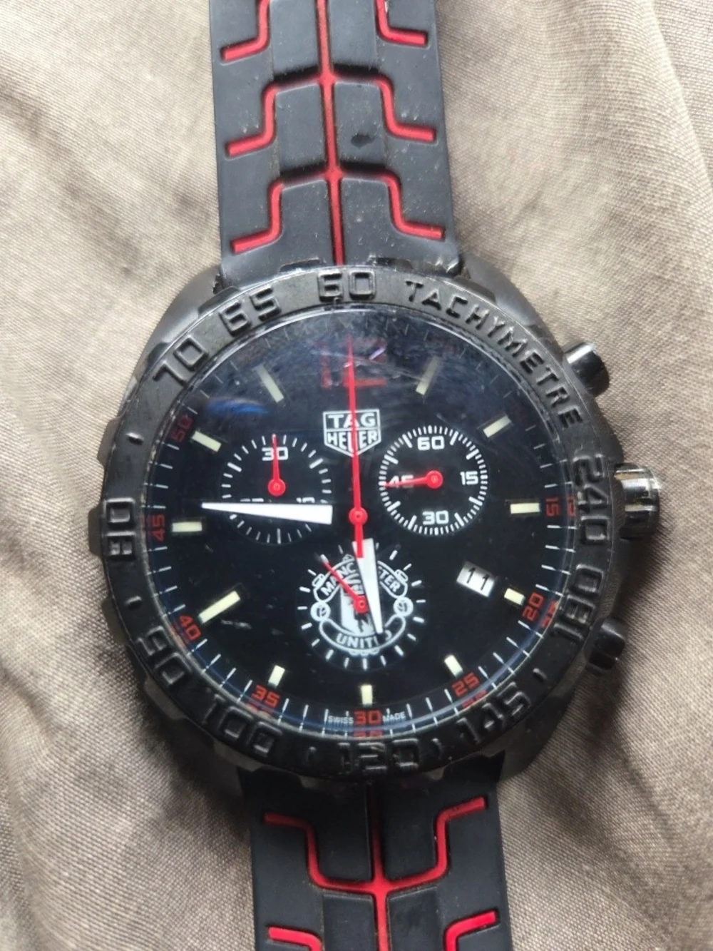 TAG Heuer Black Dial Chronograph Watch with Red Accents